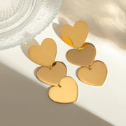 Gold-Plated Triple Heart Drop Earrings – A Bold Statement of Love and Remembrance